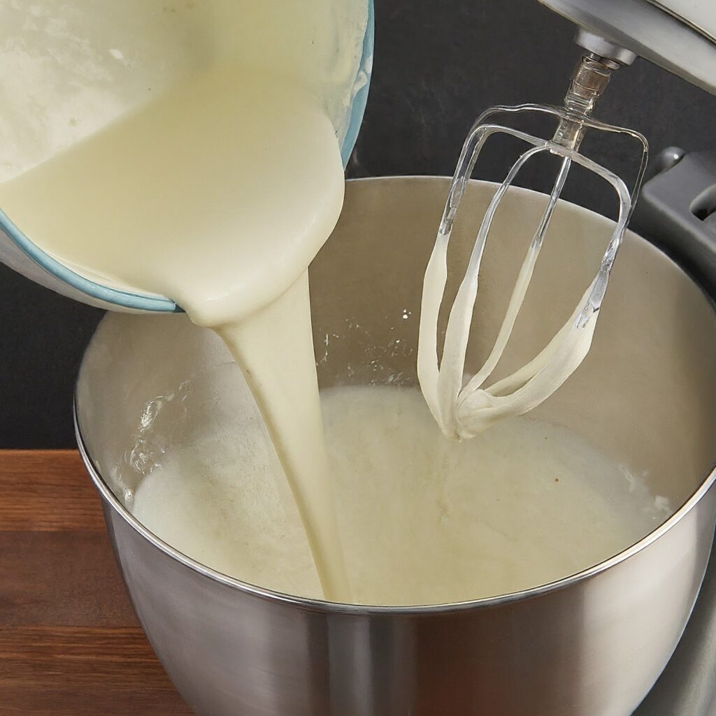 pouring cream in mixer